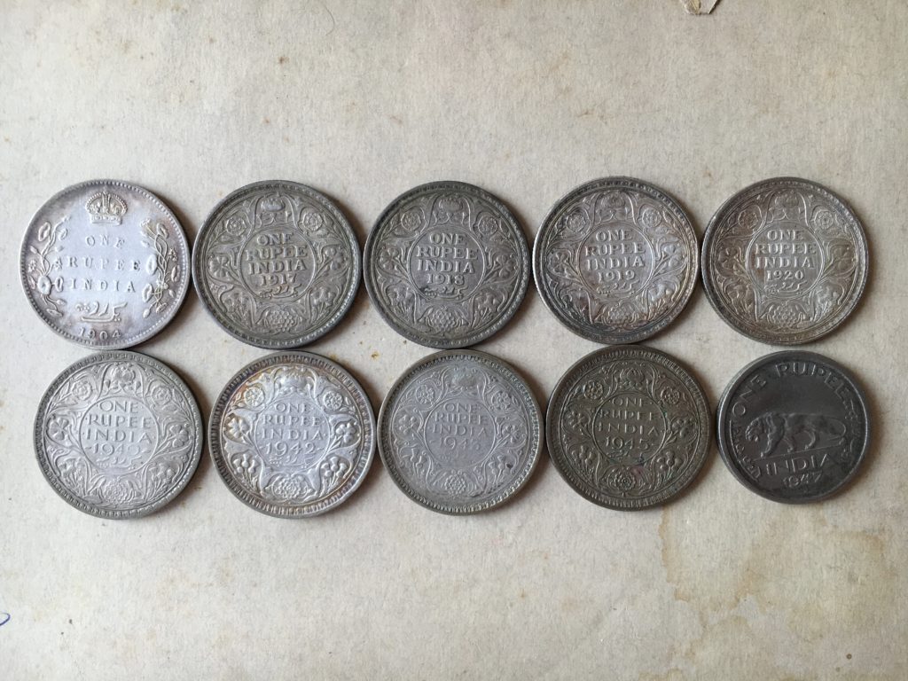 Collection of one rupee coins