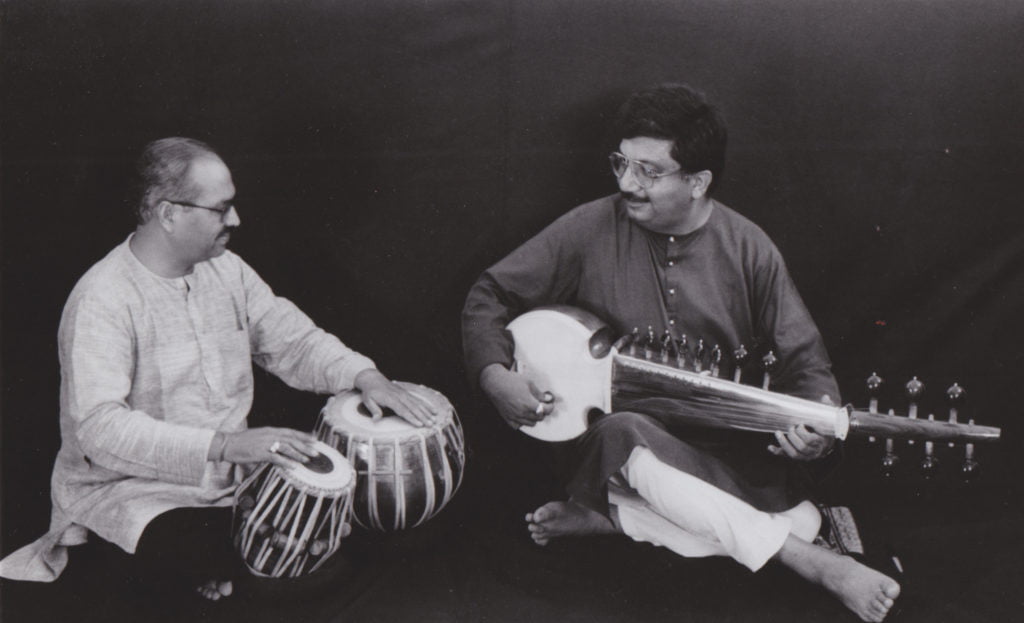 Promod Shanker (right) and Kamal Kant Sharma (left) playing Tabla together. They were both a part of the 1985 expedition.